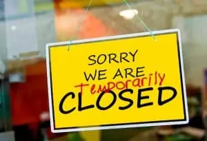 Sign stating " Sorry we are temporarily closed"