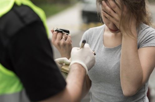 intoxicated woman pulled over after drunk driving accident