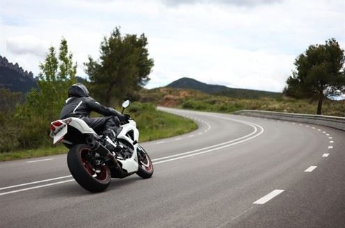 motorcyclist riding on the highway