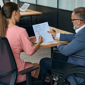 istockphoto-1442036266-2048x2048-crop An attorney is speaking to someone looking for legal representation