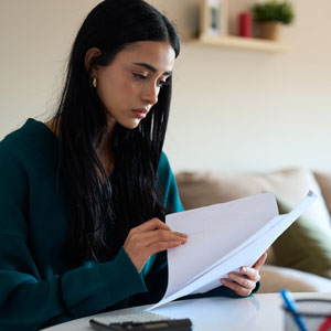 istockphoto-2197977332-2048x2048-crop A young woman prepares for her court hearing