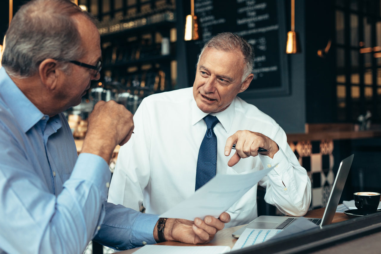A lawyer is having a consultation with a private practice doctor/business owner